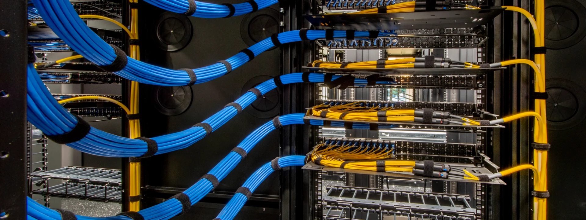 Organized network cables in server rack.